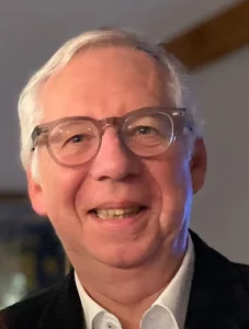 Portrait du Dr Guy Depierre, ophtalmologue spécialisé en cataracte et chirurgie oculaire à la Clinique de la vue Roanne