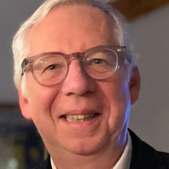 Portrait du Dr Guy Depierre, ophtalmologue spécialisé en cataracte et chirurgie oculaire à la Clinique de la vue Roanne